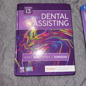 Edition 13 (newest edition) of the modern dental assistant textbook.